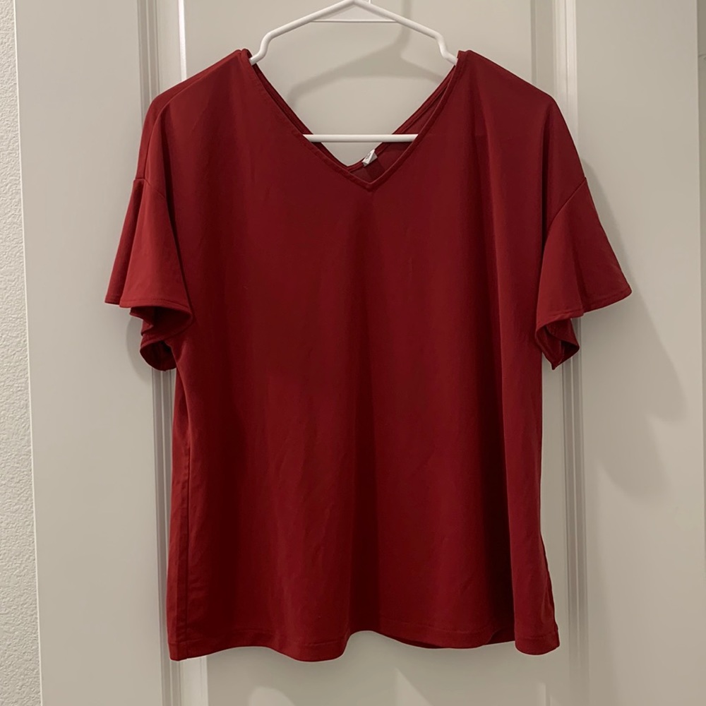Like new, worn once Uniqlo flutter sleeve V neck shirt